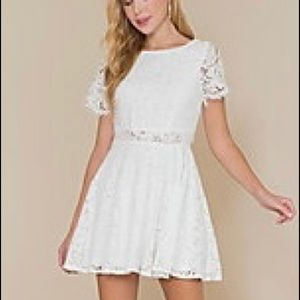 Brand new white lace party dress perfect for a special day or evening out!